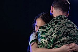 overjoyed woman hugging returning veteran