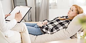 woman receiving counseling in a therapist's office