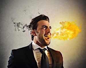 Angry violent man about to explode breathing fire and smoke