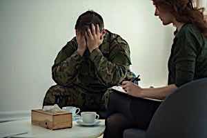 soldier crying in psychologist's office