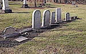 old gravestones in various conditions