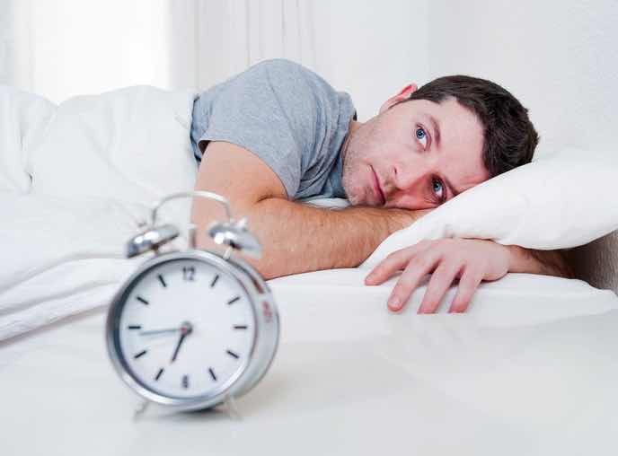 man worry cant sleep alarm clock