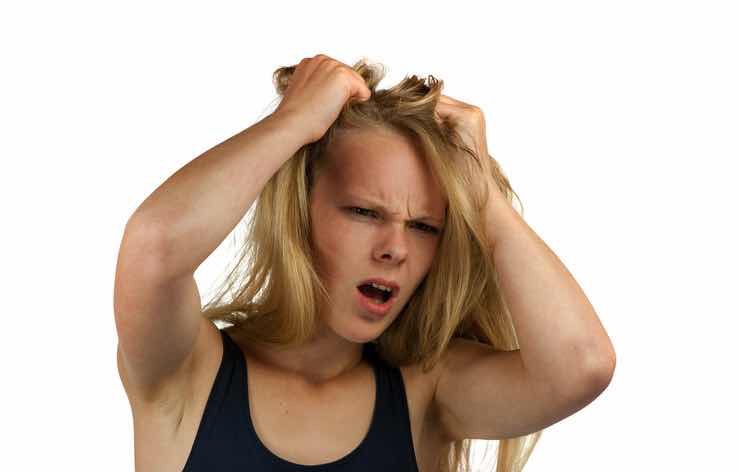 hair pulling frustrated angry woman