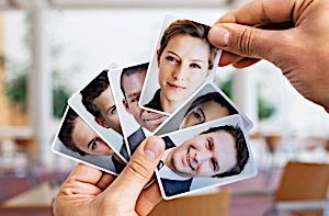 man looking at picture of woman