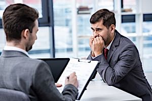 Nervous salesman making presentation to buyer