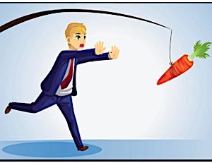 businessman chasing a carrot on a stick