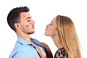 Woman kissing man