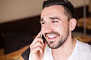happy man talking on phone