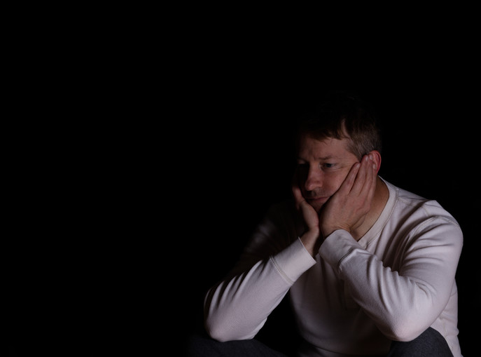 isolated man looking emotionless