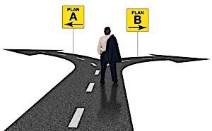 businessman at crossroads facing  choice