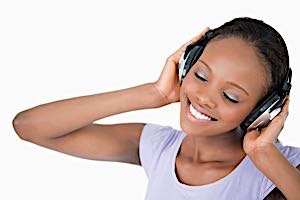 Happy woman listening to headphones