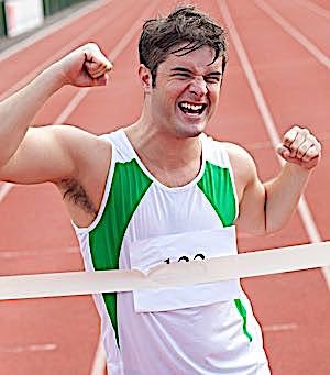 victorious athlete ecstatic at finish line