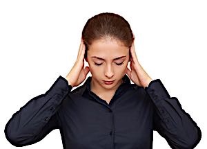 woman thinking hard introspecting hands to head eyes closed