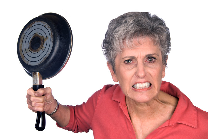 Angry grandmother threatens viewer with frying pan