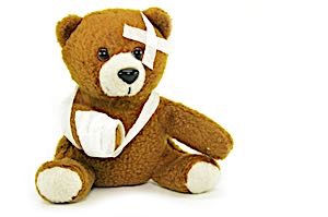 Toy with hand bandaged up
