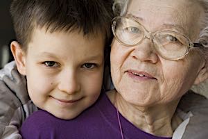 photo of happy boy and grandmother
