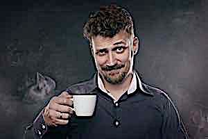 sleazy boastful man holding cup of coffee