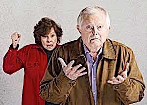 Older crazy woman angry at puzzled clueless man