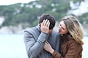 Woman consoles devistated man