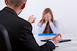Woman crying after being fired.