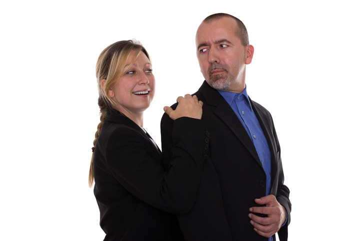 aggressive woman with annoyed man