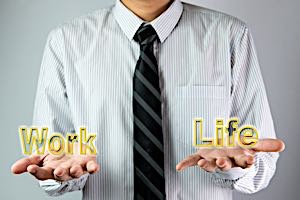 man deciding between two signs titled work and life
