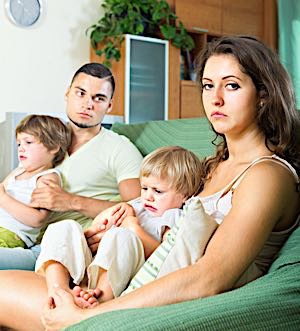 unhappy looking family