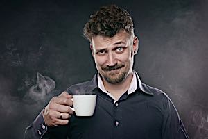 Smug man looking critically