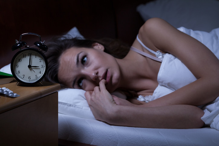 woman unable to sleep due to worry