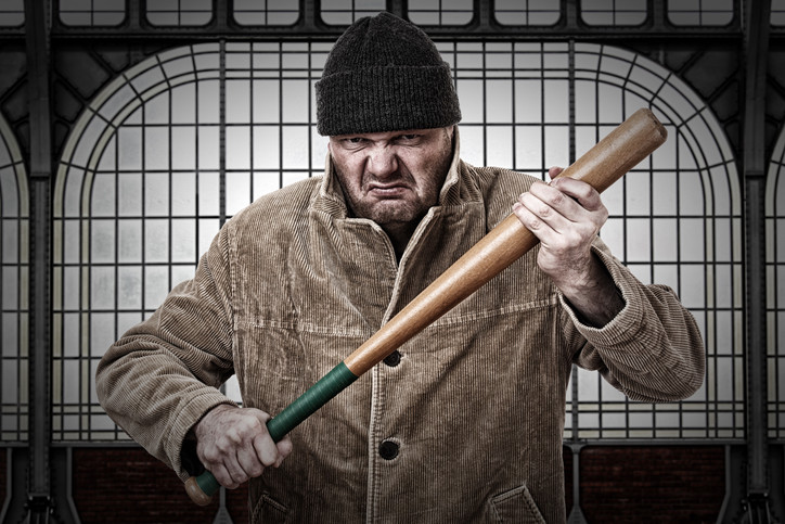 violent thug threatening the viewer with a baseball bat