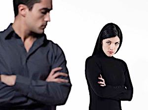 angry woman and man w folded arms