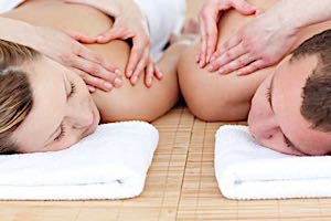 man and woman couple having massage together