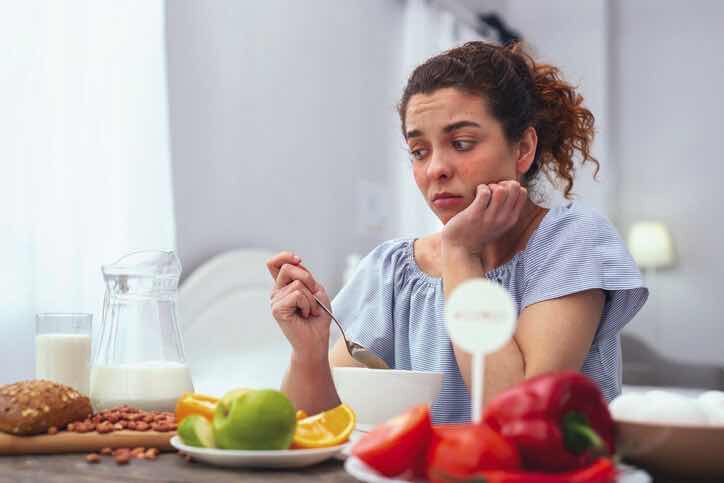woman with no appetite forced to eat dinner