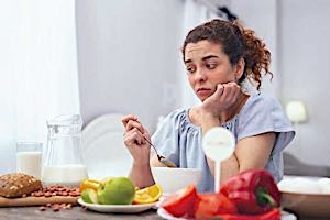 woman with no appetite forced to eat dinner