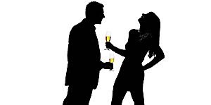 unfaithful man and woman holding drinks and laughing at a party