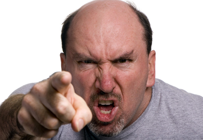 angry man pointing threatening finger