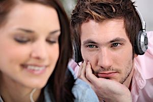 Man gazes lovingly at woman