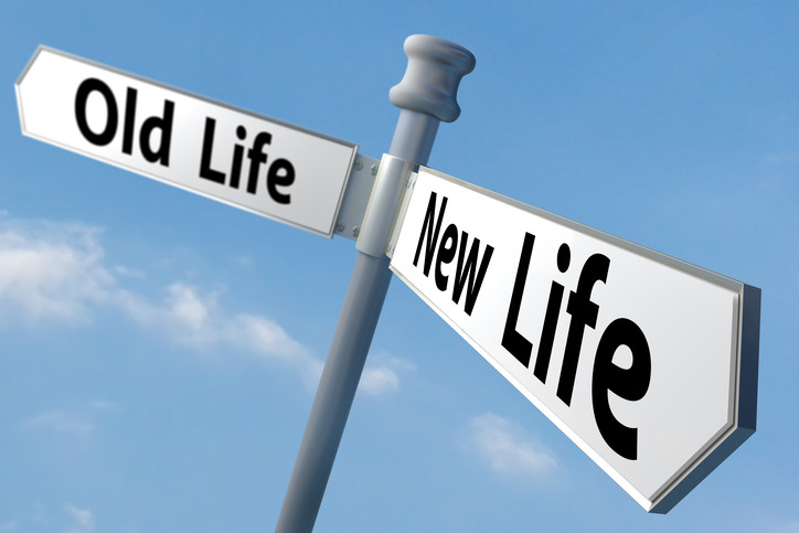 two signs reading old life and new life