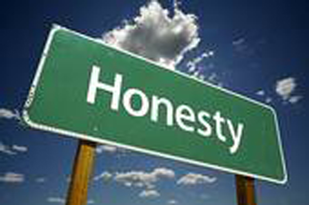 sign with text reading 'honesty'