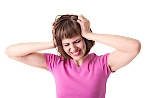 Hopeless frustrated woman holding hands to head