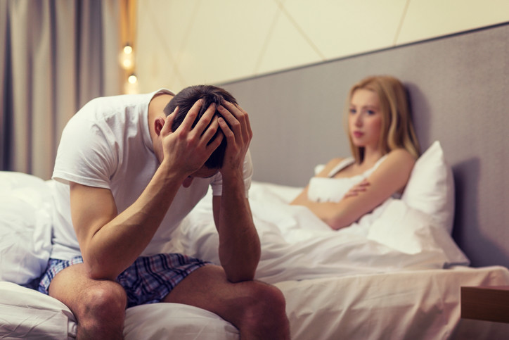 unhappy couple in bed having no intimacy
